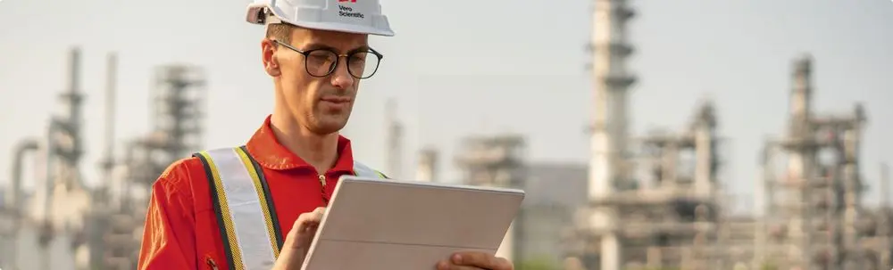 Engineer using tablet at industrial site